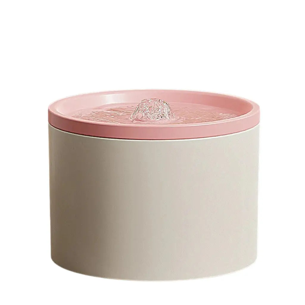 Cat ceramic water fountain with pink top on a white background