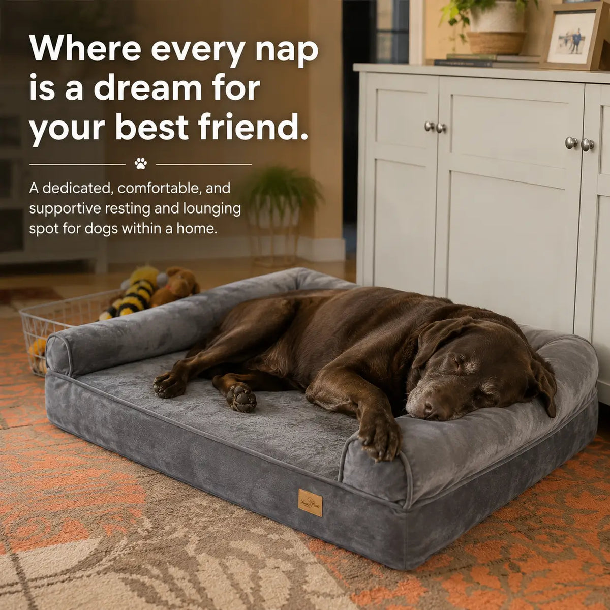 A brown dog lies resting on a plush gray rectangular pet bed
