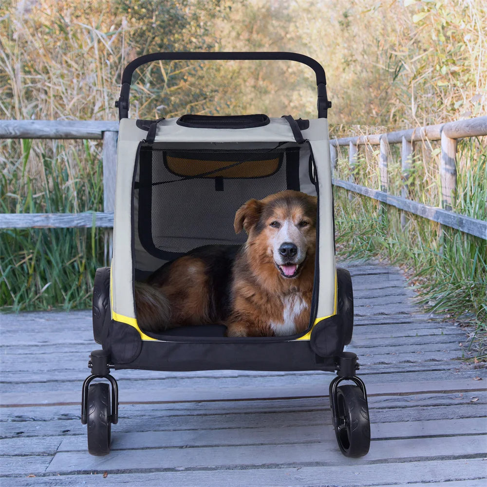 Dog in a pet stroller on a wooden path with grass and a fence in the background
