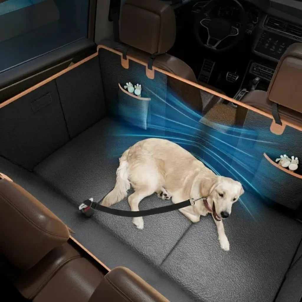 Dog lying on a car seat cover with a pet safety harness, surrounded by car interior