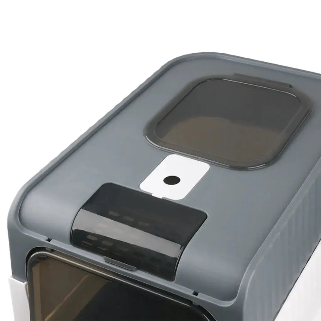 Gray cat litter box with a black interior on a white background