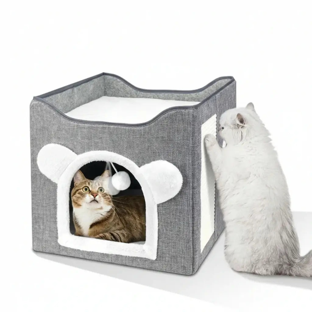 Gray pet house with a white interior and cat peeking out, on a white background