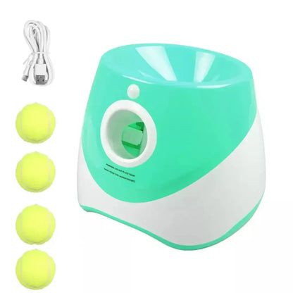 Green and white dog ball launcher with tennis balls on a white background