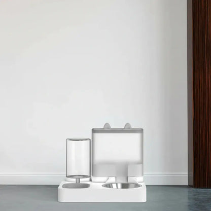 Modern pet water and food dispenser on a gray floor with a white wall background