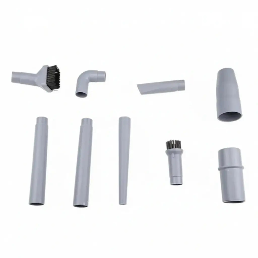 Set of various vacuum cleaner attachments on a white background