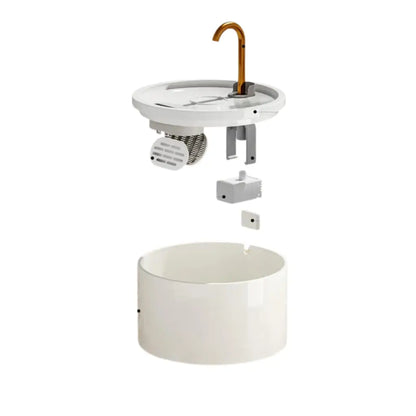 White ceramic cat fountain with components on a white background