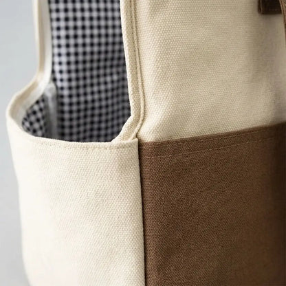 close up of brown dog carrier bag